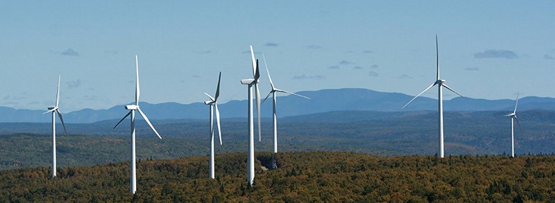 a picture of a wind mill farm