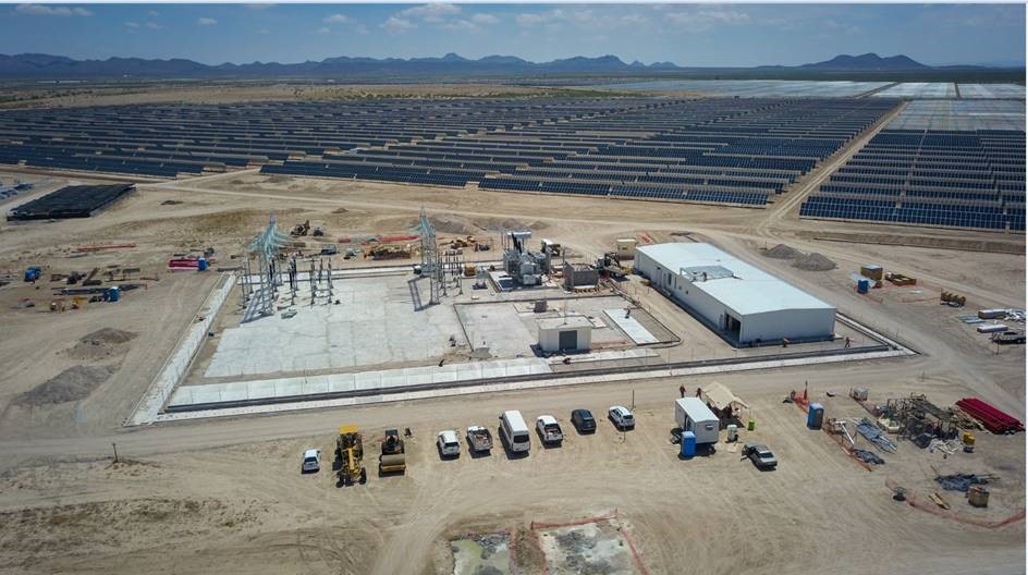 a picture of a solar panel farm under construction